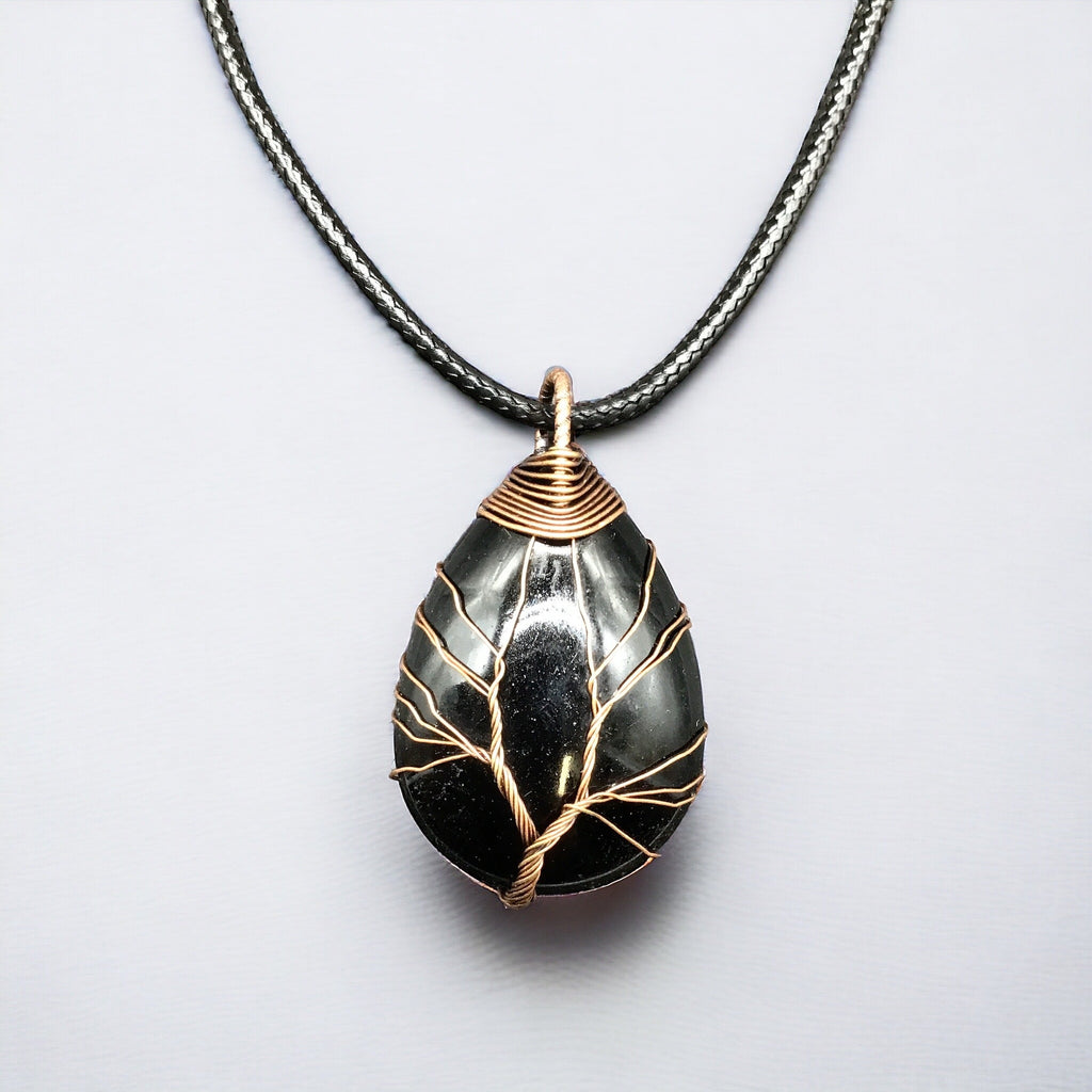 Pendentif Pierre Noire sertie d'un Arbre de Vie Doré