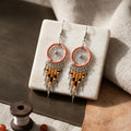 Boucles d'oreilles attrape-rêves perlées rose ancien OLDTRIBES™