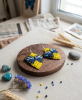 Boucles d'oreilles papillon perlées (jaunes)
