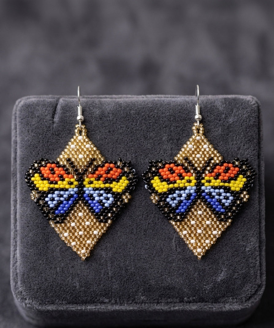 Boucles d'oreilles papillon perlées (dorées)