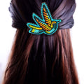 Barrette colibri perlée turquoise et orange