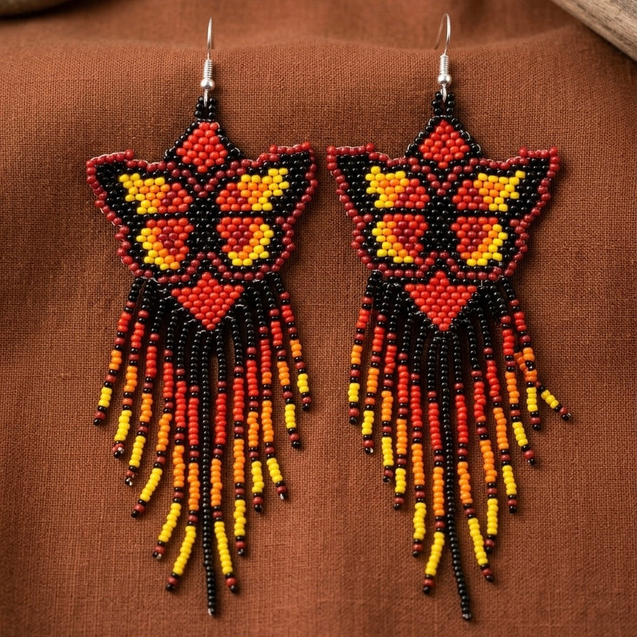 Boucles d'oreilles ailes dansantes perlées noires