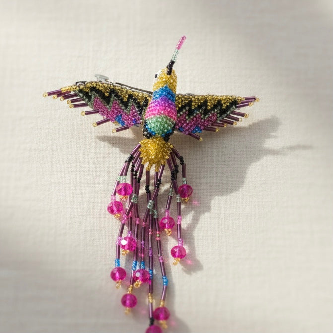 Barrette colibri or bleu rose à franges