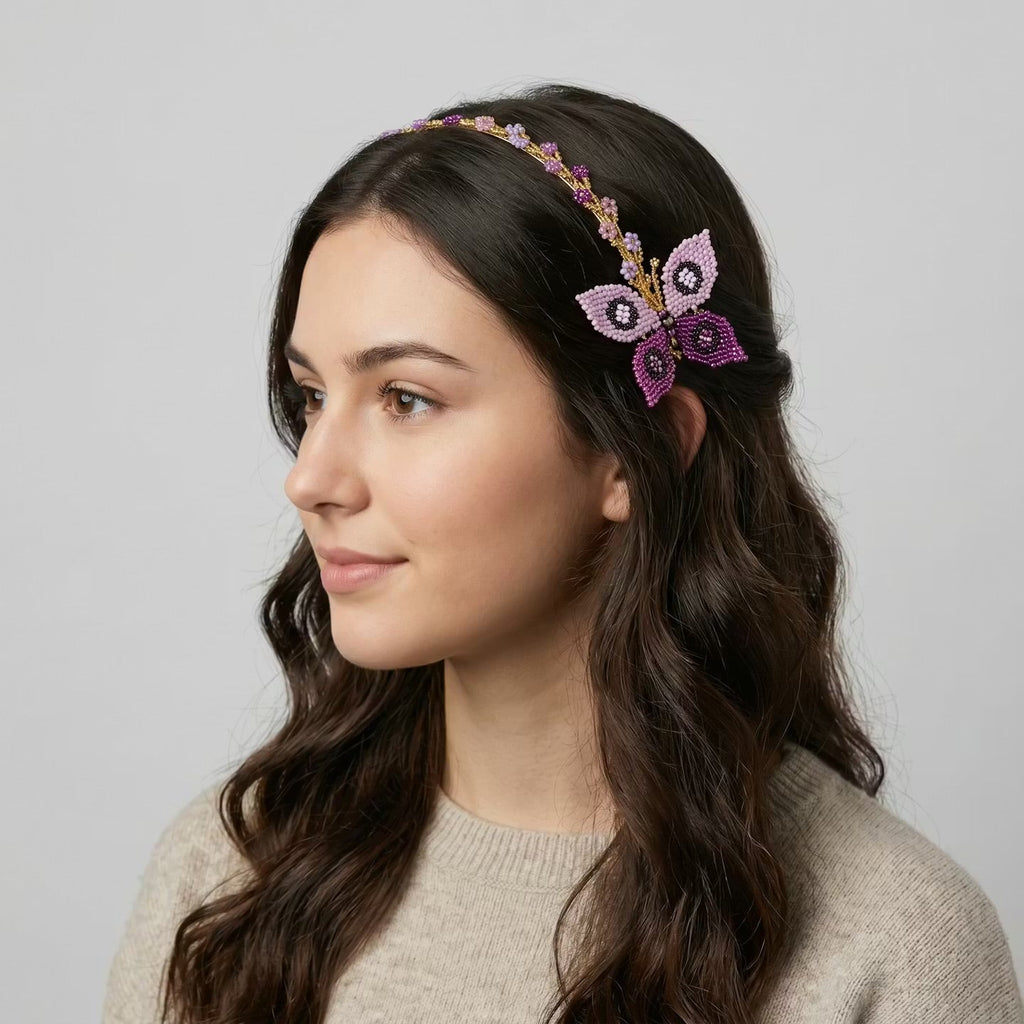 Bandeau perlé avec papillon rose