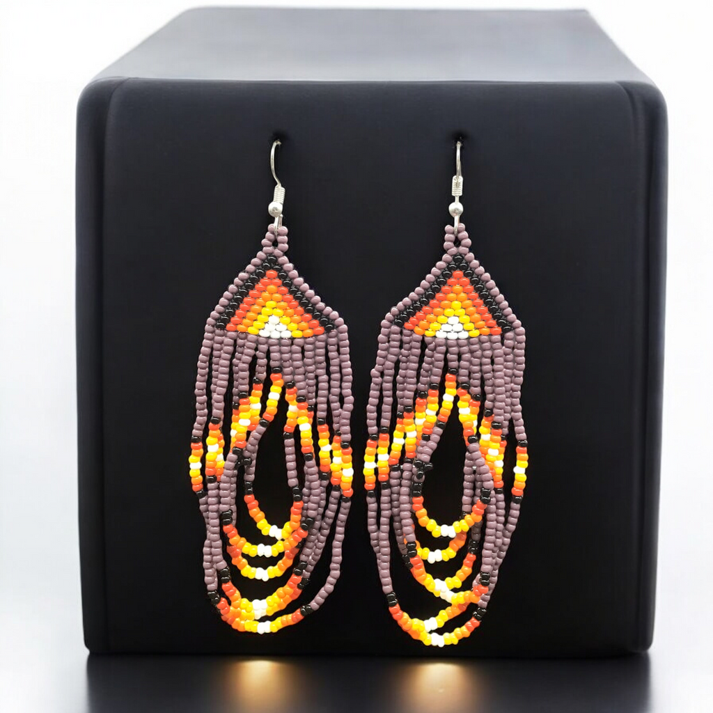 Boucles d'oreilles pendantes perlées violettes
