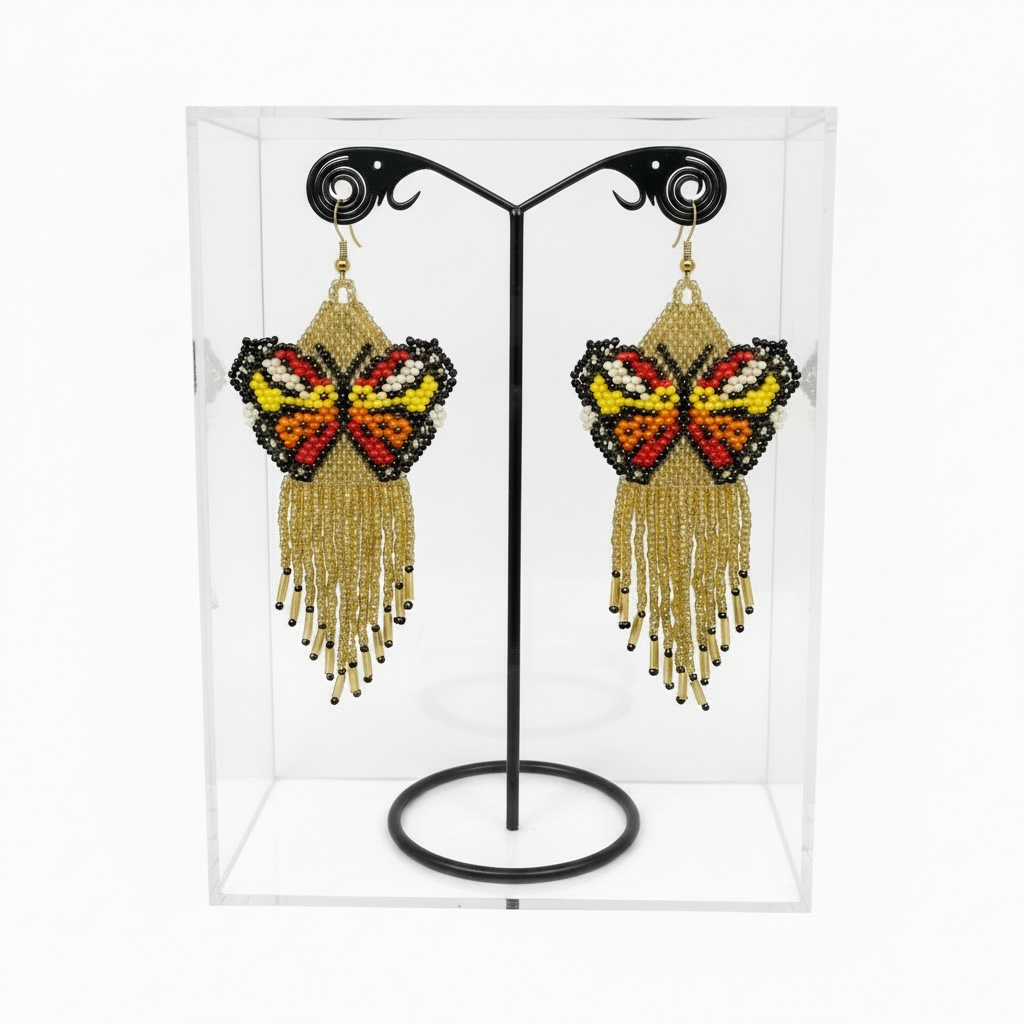 Boucles d'oreilles Ailes dansantes perlées dorées