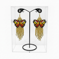 Boucles d'oreilles Ailes dansantes perlées dorées