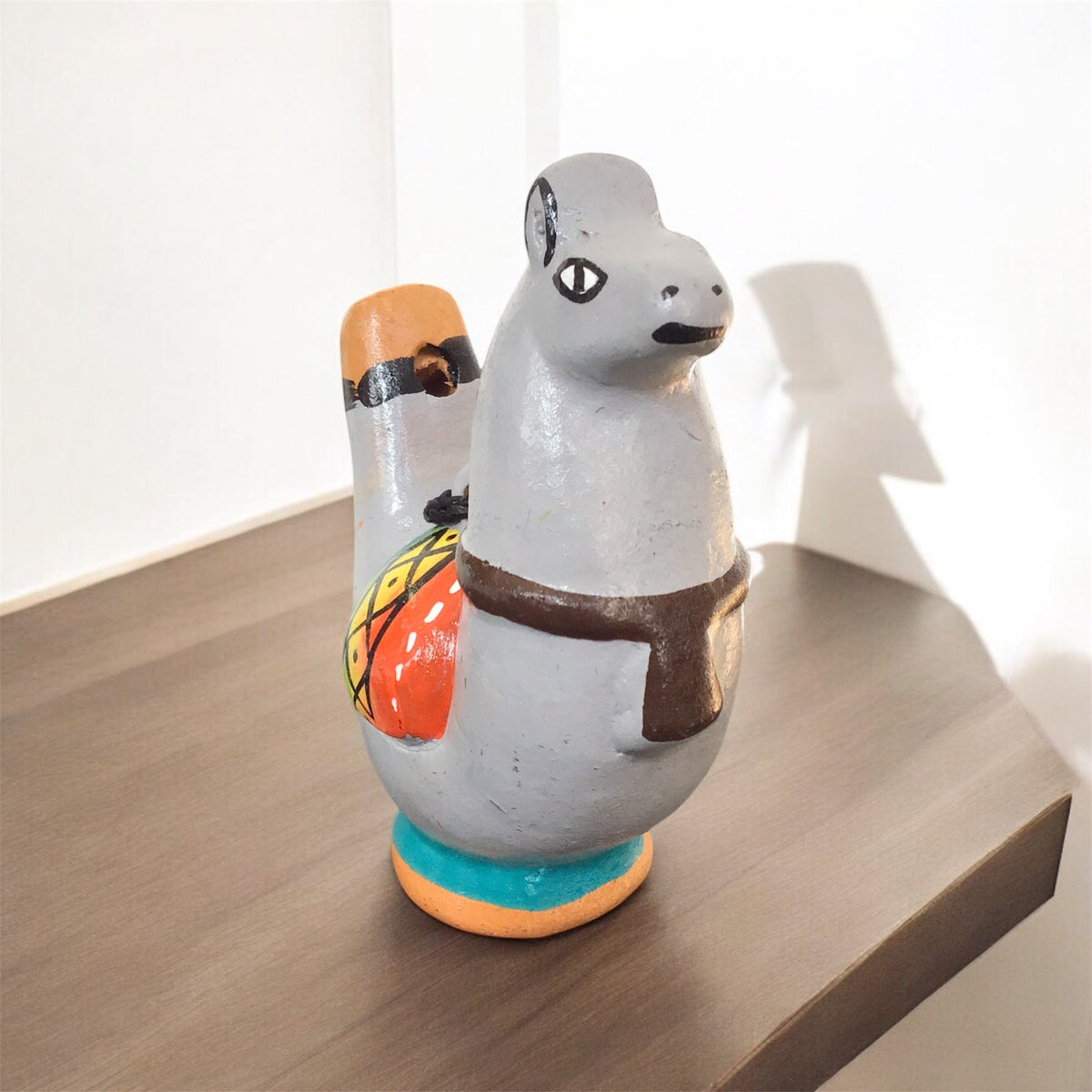 Sifflet lama-oiseau aquatique peint