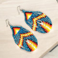Boucles d'oreilles pendantes bleu clair avec perles