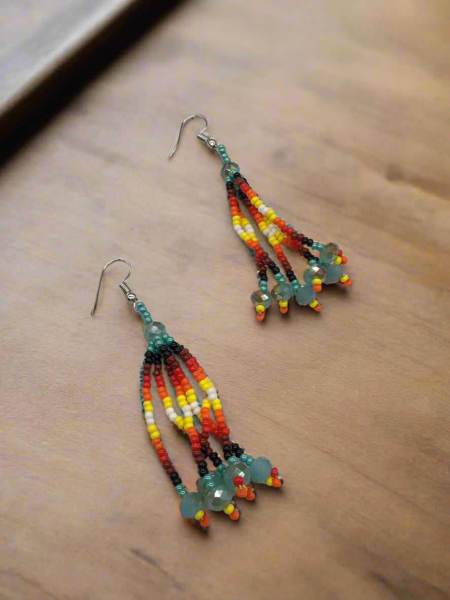 Boucles d'oreilles pendantes à six rangs de perles turquoise