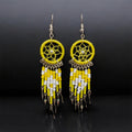 Boucles d'oreilles Attrape-rêves perlées jaunes et blanches