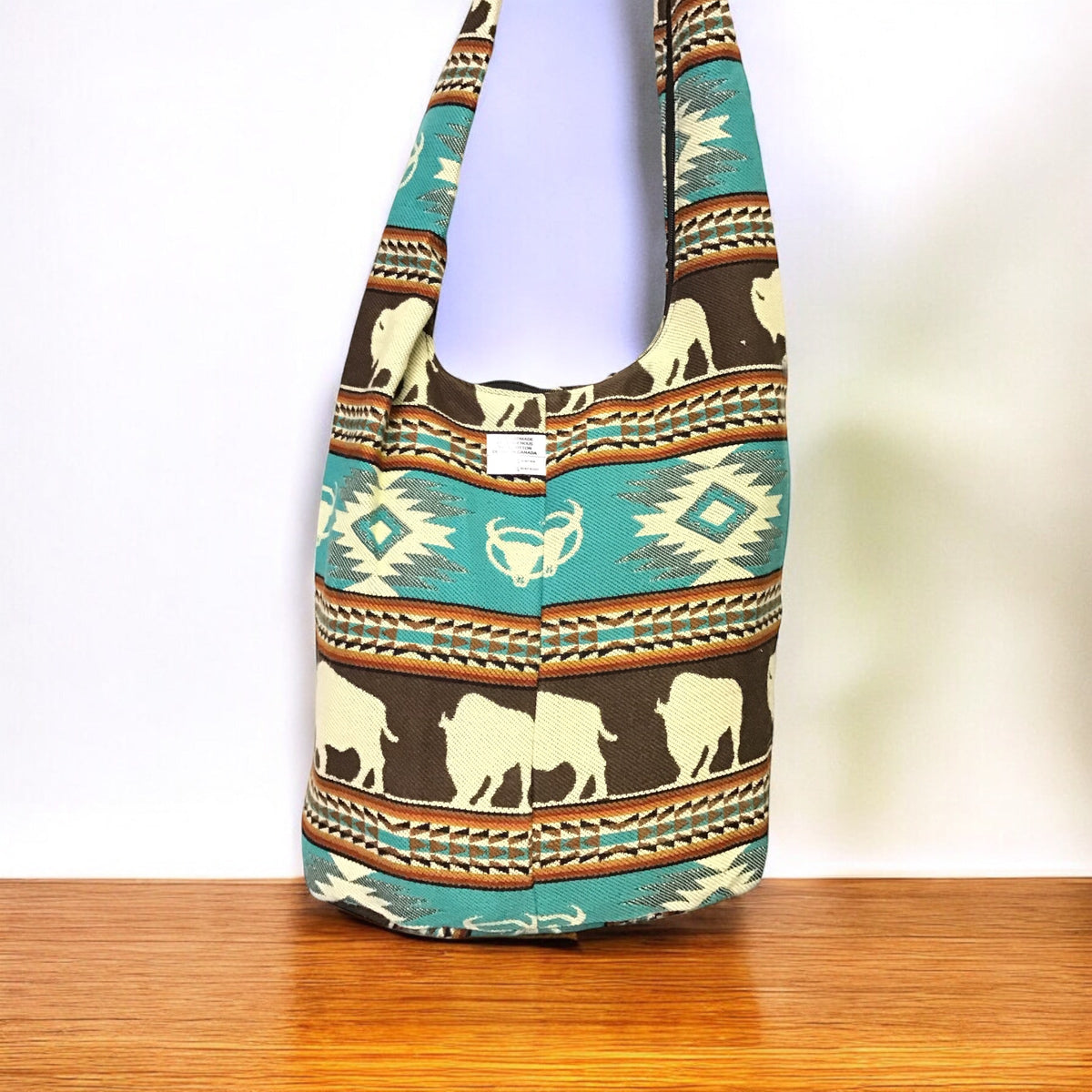 Sac bandoulière OLDTRIBES™ en cuir de buffle marron et turquoise