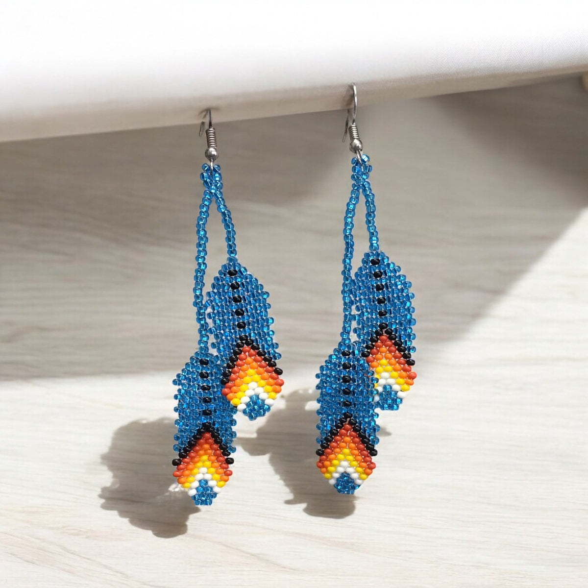 Boucles d'oreilles en plumes bleu clair OldTribes™