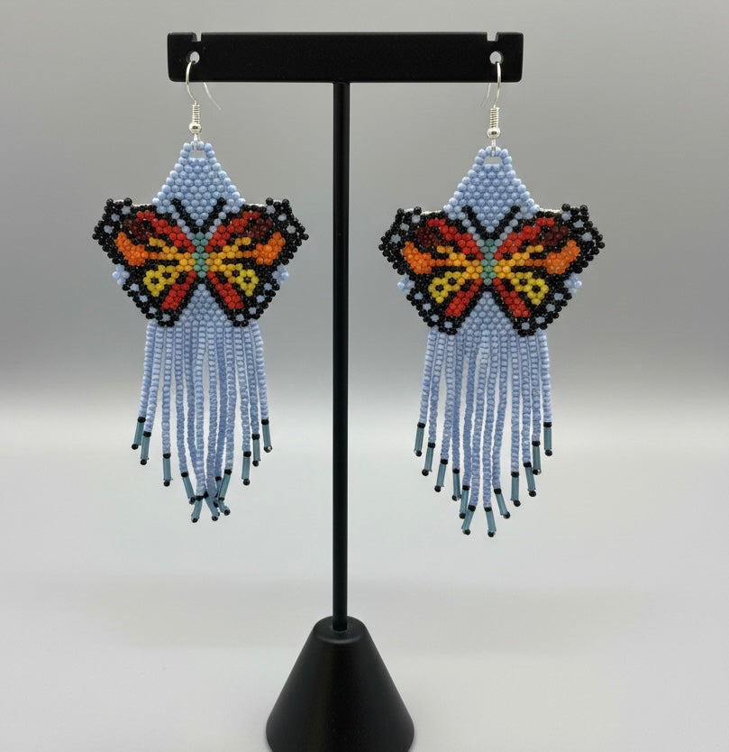 Boucles d'oreilles ailes dansantes perlées bleues