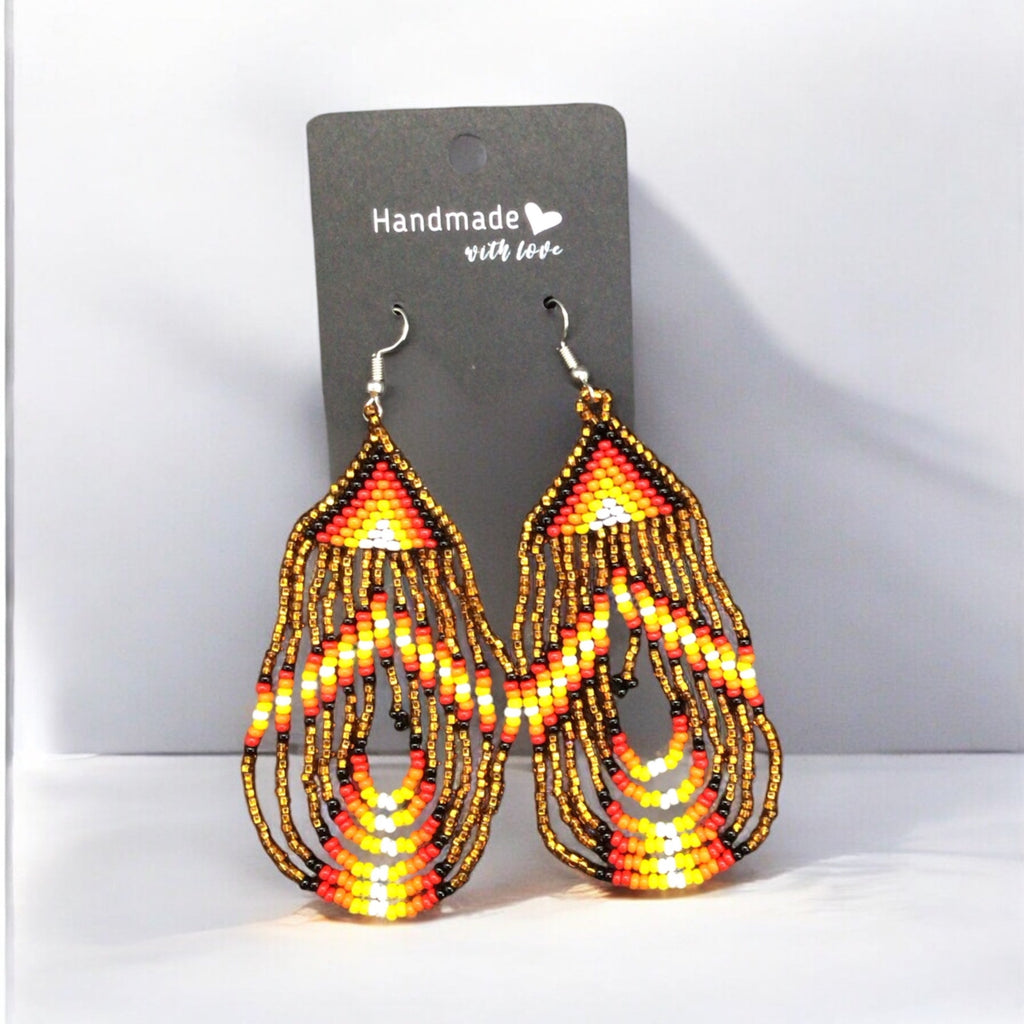 Boucles d'oreilles pendantes perlées Golden Swoop