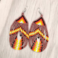 Boucles d'oreilles perlées tombantes violet clair