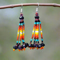 Boucles d'oreilles pendantes violettes à six rangs de perles en cascade
