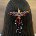Barrette colibri rouge et or avec franges