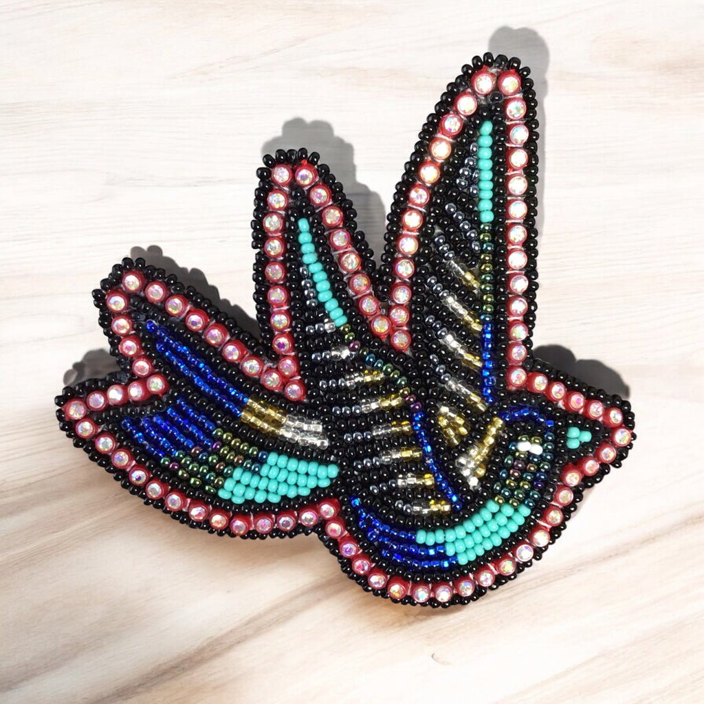 Barrette colibri perlée bleu ciel
