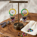 Boucles d'oreilles Attrape-rêves perlées jaune/vert