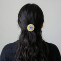Barrette fleur perlée jaune