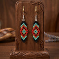 Boucles d'oreilles plume d'âme rouges