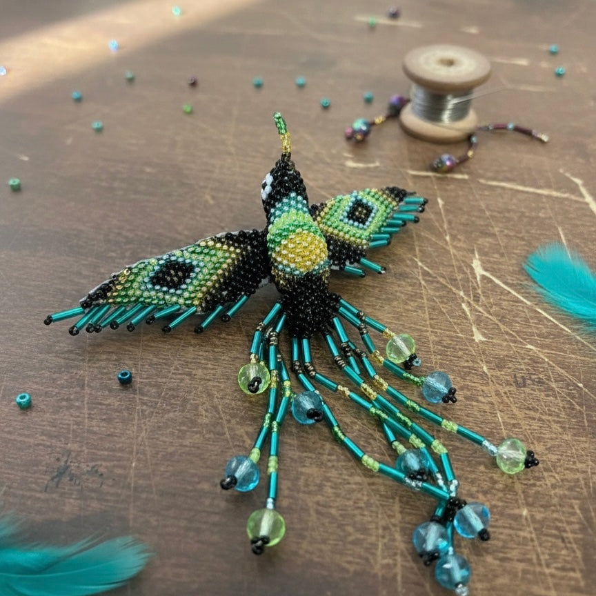 Barrette colibri noire avec franges