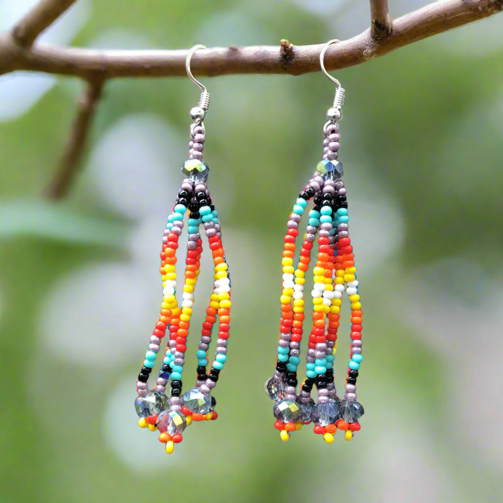 Boucles d'oreilles pendantes à six rangs de perles violet clair