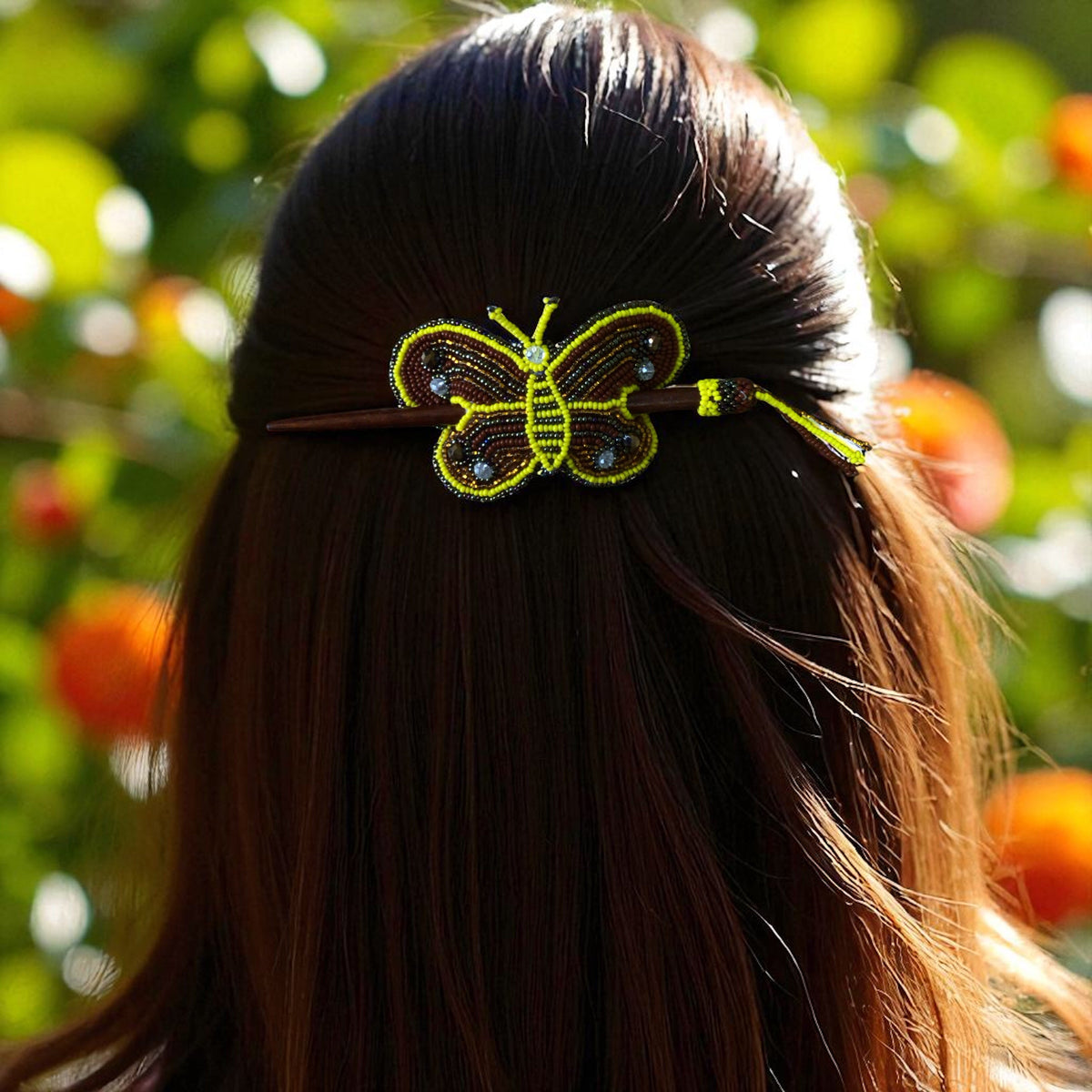 Barrette papillon faite à la main en perles jaune doré