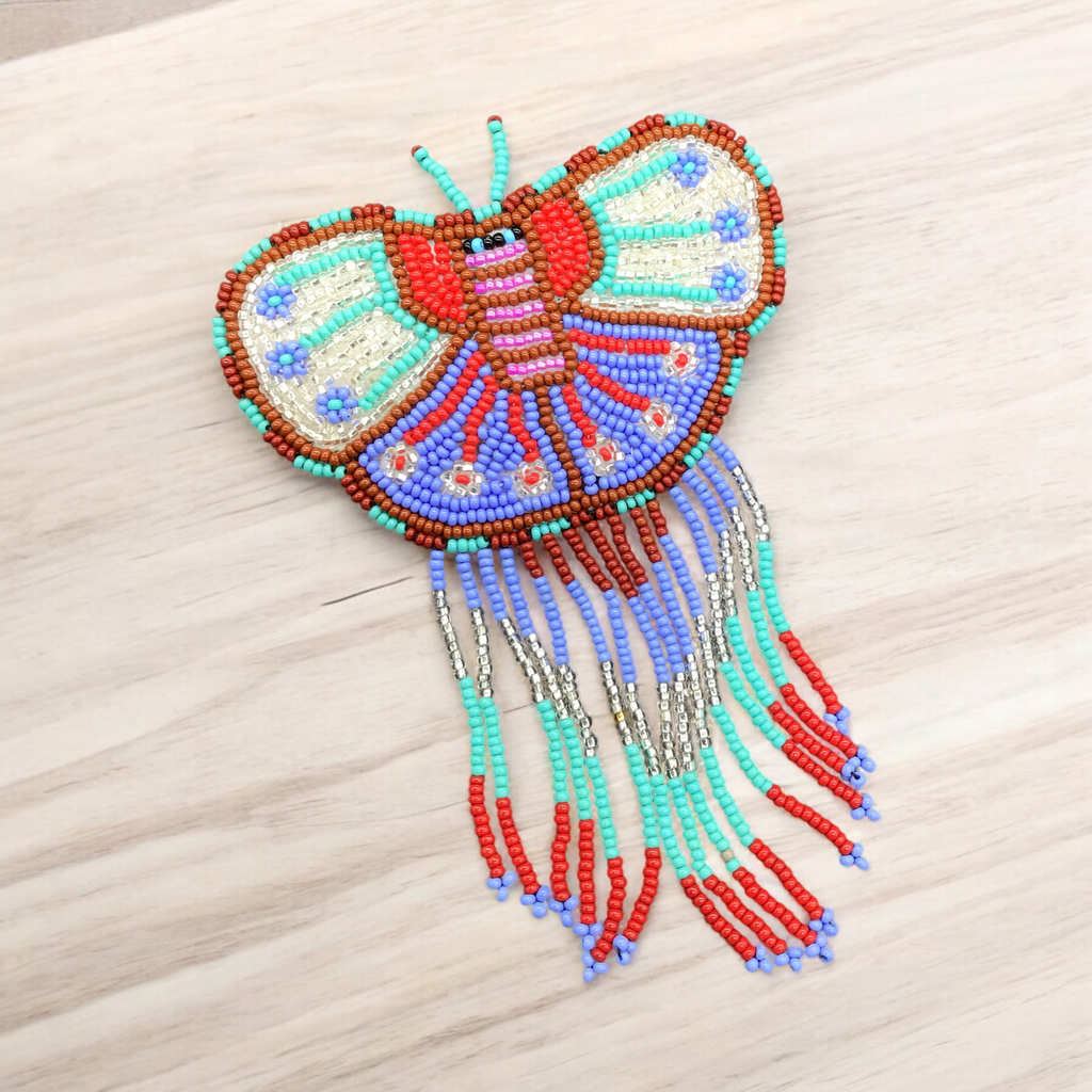 Barrettes papillons perlées avec franges Blanc et violet