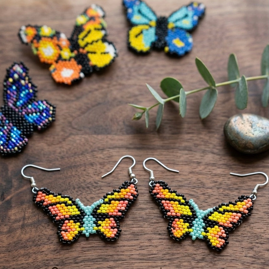 Boucles d'oreilles papillon vertes perlées