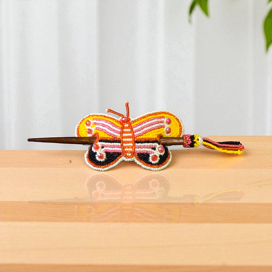 Barrette papillon faite main en perles orange
