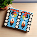 Porte-monnaie perlé OLDTRIBES™ Plume avec attrape-rêves