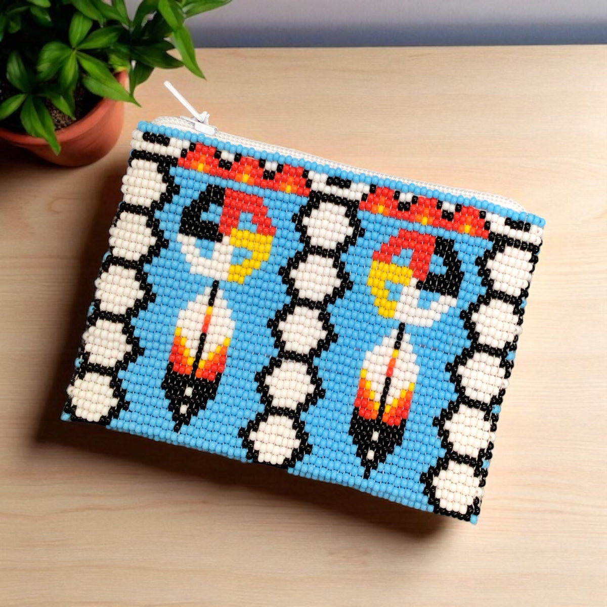 Porte-monnaie perlé OLDTRIBES™ Plume avec attrape-rêves