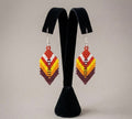 Boucles d'oreilles pendantes à plumes rouges OldTribes™