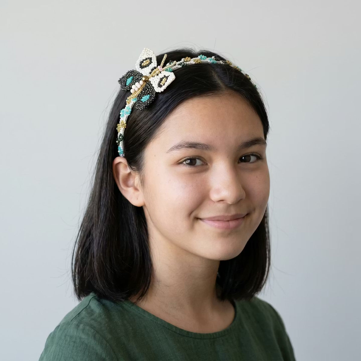 Serre-tête perlé avec papillon turquoise