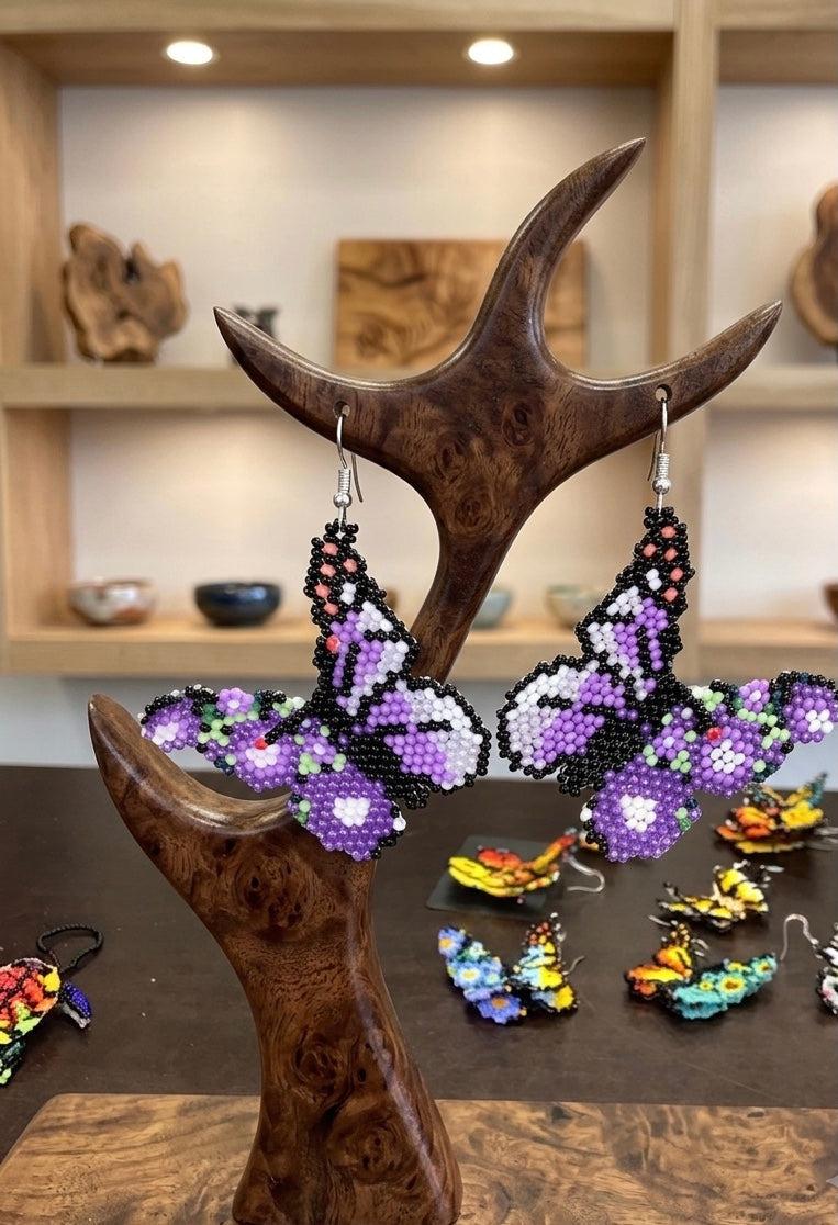 Boucles d'oreilles papillon dansant vert avec perles