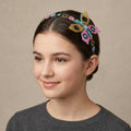 Bandeau perlé avec papillon rose