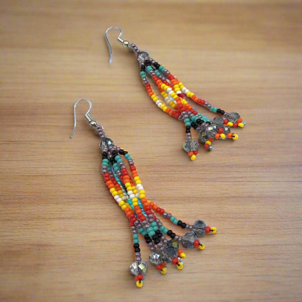 Boucles d'oreilles pendantes à six rangs de perles violet clair