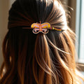Barrette papillon faite main en perles orange