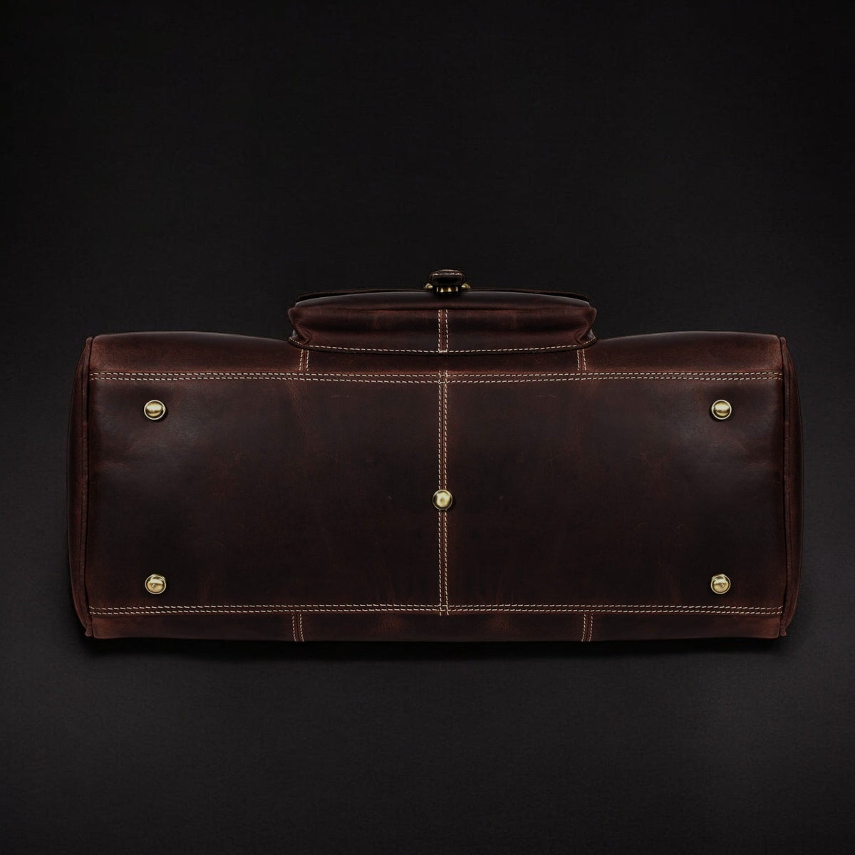 Le sac de voyage The Voyager Duffle en cuir pleine fleur vieilli marron