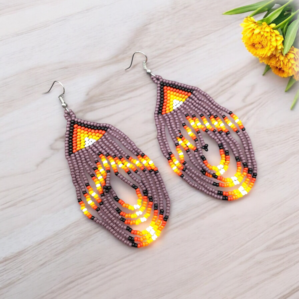 Boucles d'oreilles pendantes perlées violettes