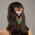 Barrettes perlées papillon avec franges rouges et vertes