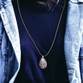 Pendentif en pierre précieuse violette avec arbre de vie en argent