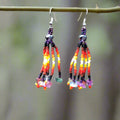 Boucles d'oreilles pendantes violettes à six rangs de perles en cascade