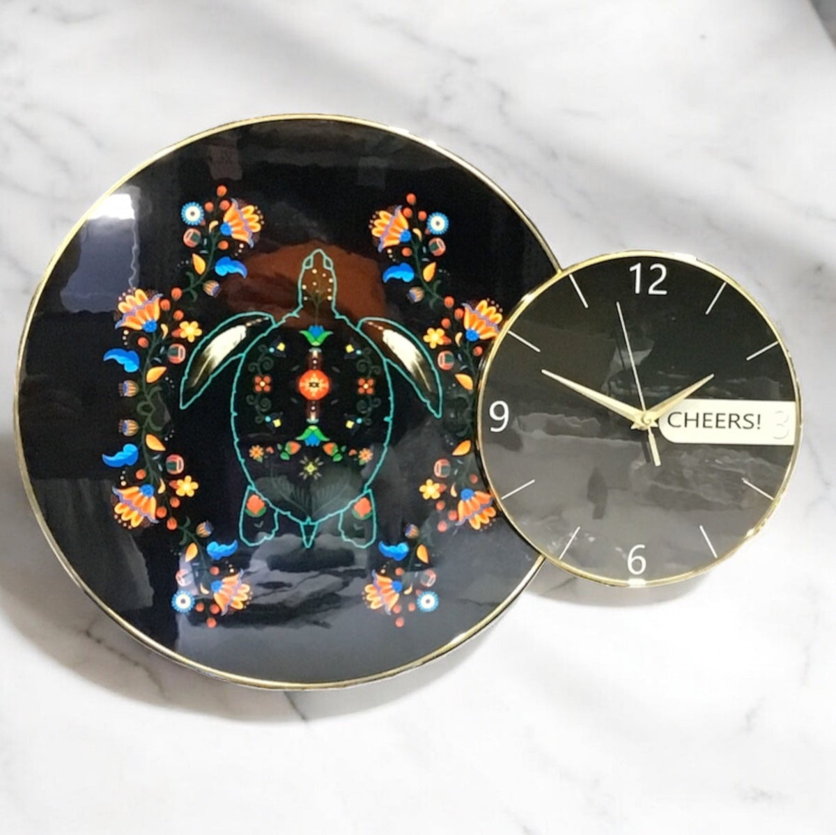 Horloge murale noire tortue autochtone