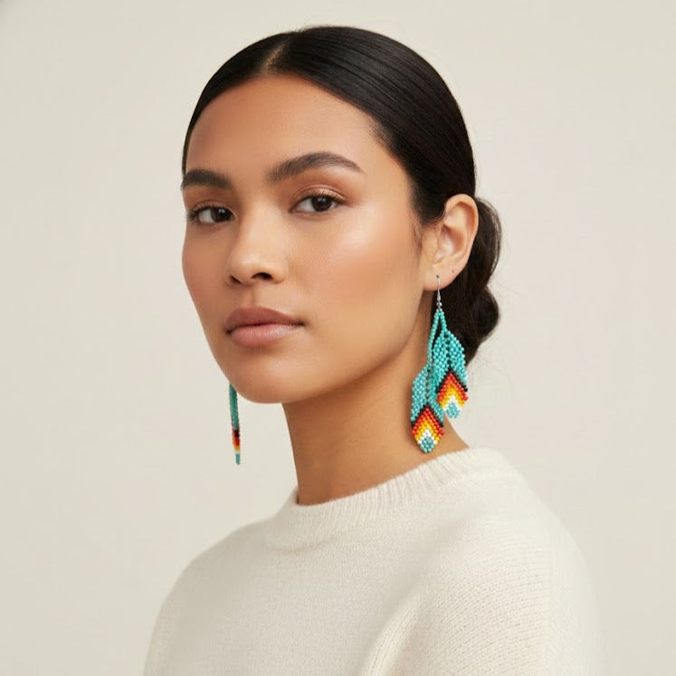 Boucles d'oreilles en plumes perlées turquoises OldTribes™