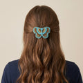 Barrette perlée papillon turquoise
