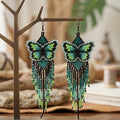 Boucles d'oreilles Ailes dansantes vertes perlées