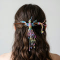 Pic à cheveux orné d'un colibri bleu et de perles
